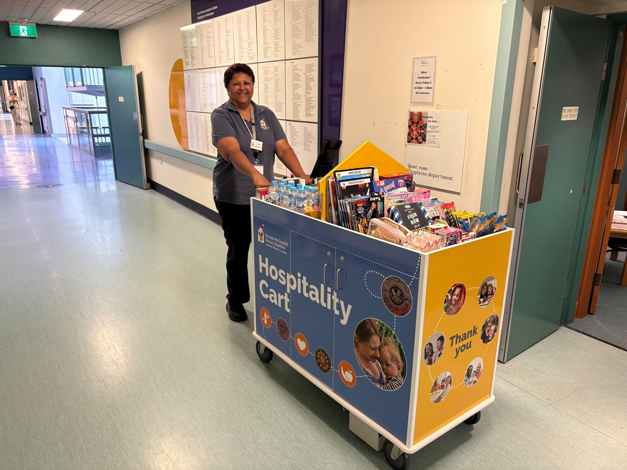 RMHC GWS volunteer operating the Hospitality Cart at The Children's Hospital at Westmead